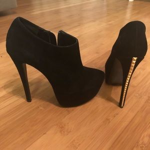 Black Steve Madden heels with gold accent